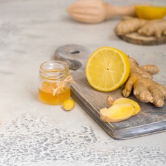 Ginger tea with honey and lemon. Warm revitalizing beverage used to help relieve cold and flu symptoms.