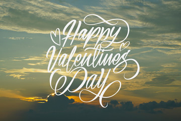 Happy valentine big white latter with sunset as a background