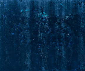 The vintage dirty concrete wall in blue tones. Beautiful background for your ideas