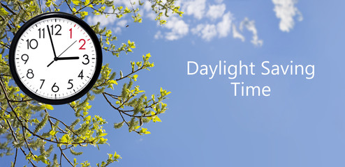 Daylight Saving Time (DST). Blue sky with white clouds and clock. Turn time forward (+1h).