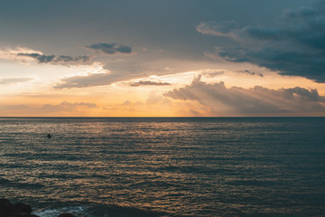 Sea horizon line and sunset photo.
