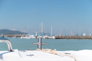 Fototapeta premium Close up at anchor In front of speed boat while sailing to the bay with calm sea wave