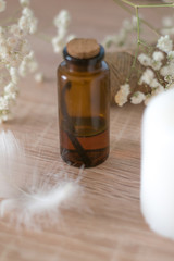 vial essential oil bottle Gypsophila  candle rustic white twine rope wood oak board cotton