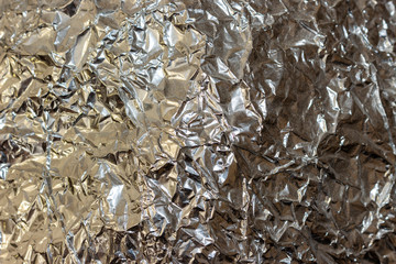 heavily crumpled aluminum food foil
