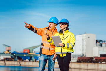 Workers in a commercial river port