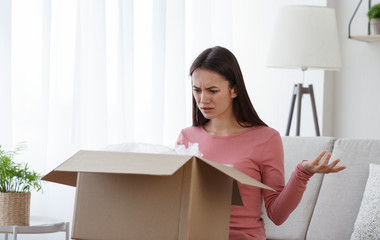 Confused young woman feel frustrated with wrong order