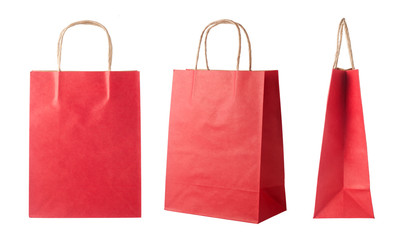 Red paper shopping bags isolated on white background