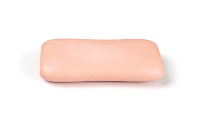 Pink soap bar isolated on white background