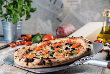 Serving a italian pizza. food photography recipe idea