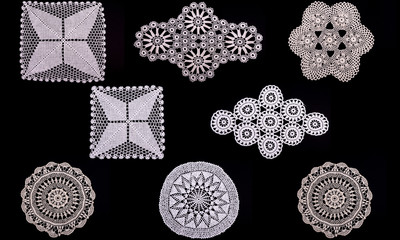 White hand made crocheted coaster lace doily collection on black background - obrazy, fototapety, plakaty