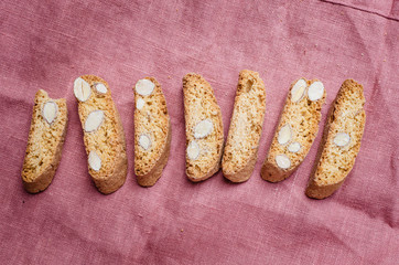 Italian tuscan traditional cookies cantuccini with desert wine in glass.