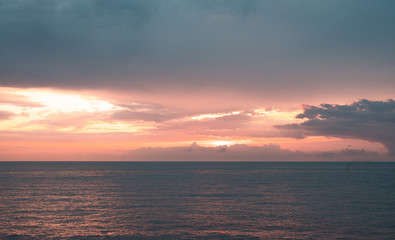 Perfect looking clouds and sea reflecting light, seascape.