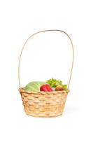 Fototapeta na wymiar set of different fresh vegetables in a wicker basket isolated on a white background. Healthy eating concept