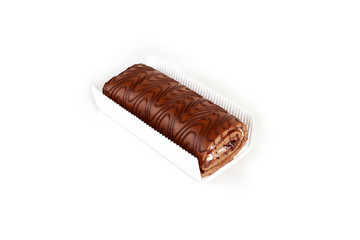 Chocolate biscuit roll cake in package, isolated on white background.