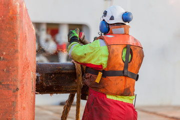 NORTH SEA, NORWAY - 2015 JANUARY 19. Able seaman working on deck during offshore rig move operation.