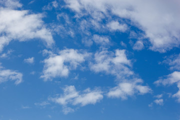 Low Angle View Of Clouds In Blue Sky.