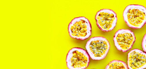 Fototapeta na wymiar Passion fruit on yellow background.