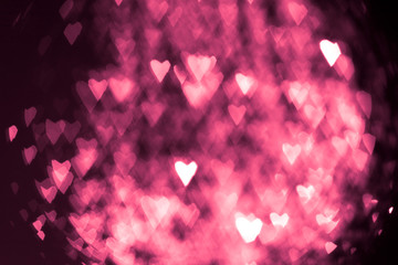 pink or red abstract background with hearts bokeh