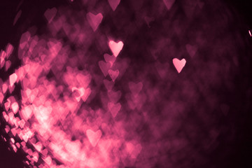 pink or red abstract background with hearts bokeh