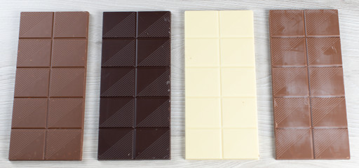 Delicious white, black, hazelnut and milk chocolate flavored chocolate tablets