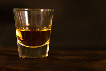 Close up whisky on dark background.