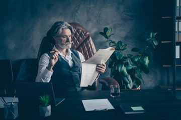 Smart cool dandy old retired man ceo grandfather grey white hair grandfather sit chair relax rest...