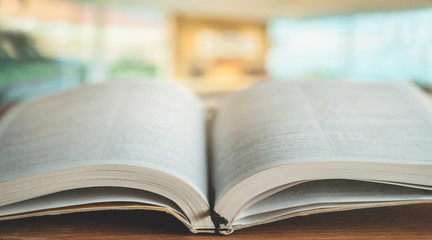 Bible on a background of home interior. The concept of faith, spirituality and religion.