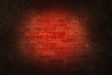 Gloomy red brick wall. Industrial texture with vignette.