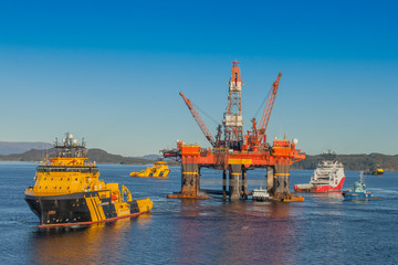 OLEN NORWAY - 2014 OCTOBER 16. The semi-submersible drilling rig West Alpha with Anchor Handling...