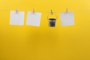 blank notes hanging on a clothesline