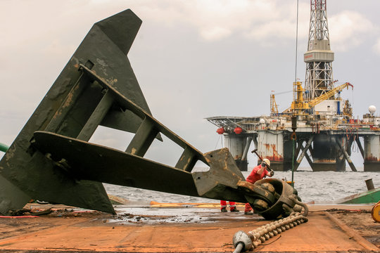 POINTE NOIRE CONGO - 2009 APRIL 10. The semi-submersible drilling rig Global Santafe GSF 135 rig anchor on deck on Bourbon Borgstein.