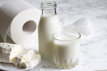 Lactose intolerance and diarrhea concept with diary and toilet paper