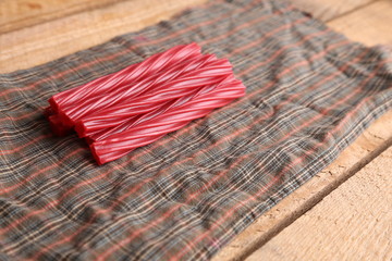 sweet red gummy licorice in color background