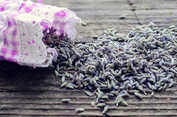 Bunch of lavender flowers and sachet filled with dried lavender