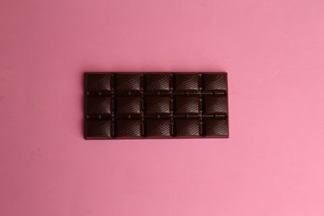 milk chocolate tablet in color background