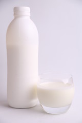 liquid yogurt bottle in color background