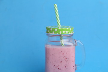 blackberry smoothie in color background