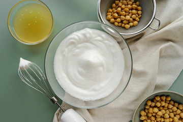 vegan cooking concept, egg replacement , chickpea's whipped liquid (called aquafaba)