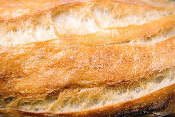 Bread texture, close-up. French baguettes texture background. Freshly baked bread, top view.