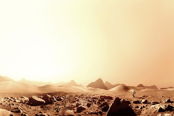 Space man in a suit walks on the red planet Mars. View of Landscape Mars with sunset. © alones
