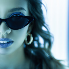 Portrait of face pretty young woman in sunglasses with color makeup with sexy lips with curly...
