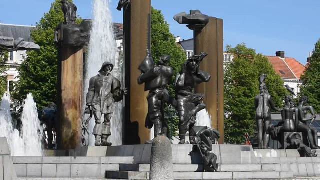 Sculpture group with fountain at the square Het Zand in Bruges, Flanders, Belgium
