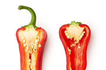 Macro shot if halved red bell pepper isolated on white background