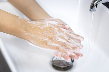 hygiene concept. washing hands with soap in sinks, keep clean to protect from virus and bacteria...