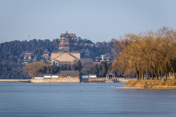 Kunming Lake in Summer Palace in Beijing, capital city of China, view on Longevity Hill with Buddhist Incense Tower and Hall of Sea of Wisdom