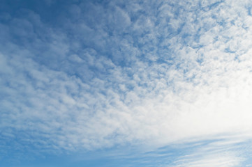 Blue sky background with clouds