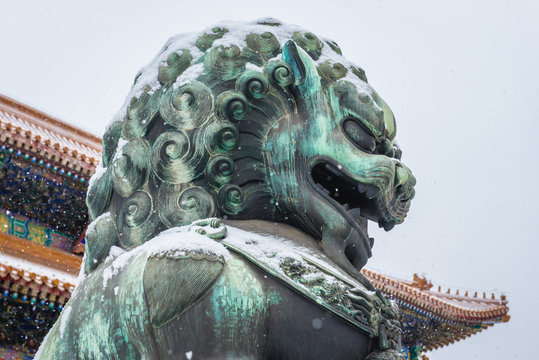 Lion sculpture in front of Gate of Supreme Harmony in Forbidden City, main tourist attraction in Beijing, capital city of China