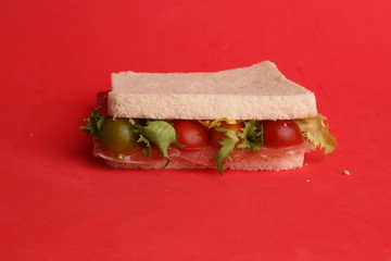 Spanish serrano ham sandwich with tomato and lettuce