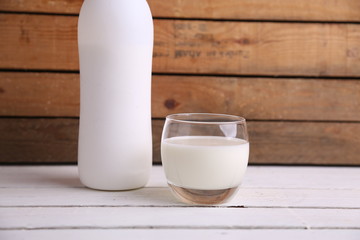 liquid yogurt bottle in color background