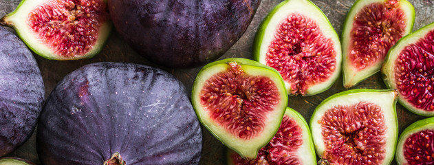 Fresh figs slices. Blue fig fruits, top view.